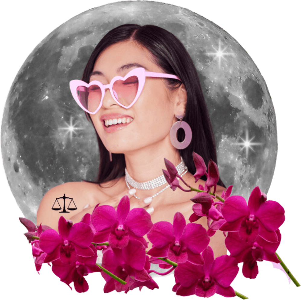 A woman in pink heart shaped sunglasses laughing in front of a full moon, surrounded by pink orchids, with the Libra scales glyph